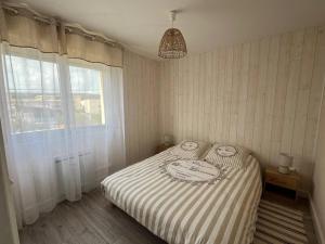 Appartement 2 étoiles à 50m de la plage avec balcon et parking privé - FR-1-619-143