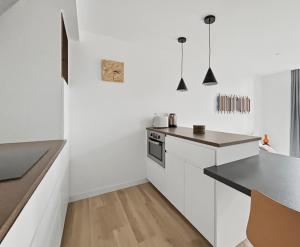 Studio lumineux avec balcon, cœur historique