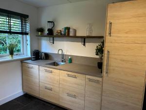 Bosboerderij de Goudsberg met hottub in tuin