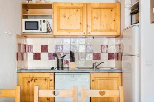 Vue spectaculaire T2 avec 1 chambre, 1 cabine proche ESF Pioupiou avec parking gratuit