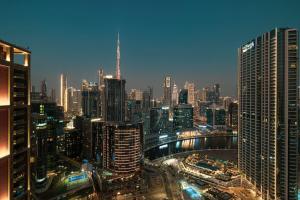 Peninsula One High Floor Apartment with beautiful Burj Khalifa and Canal Views
