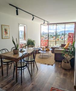 Departamento con terraza y vista a volcanes, parking, Smart TV y self check-in