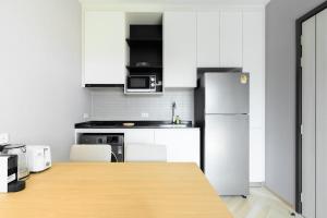 Modern Condo in Bangtao with Pools, Gym & Onsen