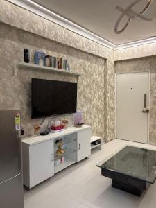 The Golden Mirror A Warm 1BHK with Balcony
