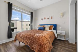 1BR retreat near Ryman with gym access