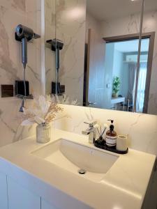 The Astra SkyRiver Luxury Condo with Rooftop Swimming Pool and Gym