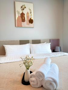 The Astra SkyRiver Luxury Condo with Rooftop Swimming Pool and Gym