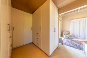 Penthouse with Home Study - Mountain Views