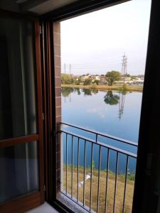 Lake and Alps near San Siro Stadium & Fiera Milano