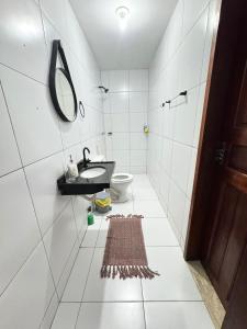 Casa no 1 piso com 2 Suítes a 200mts da praia