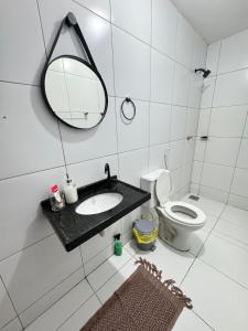 Casa no 1º piso com 2 Suítes a 200mts da praia