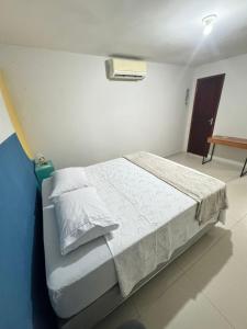 Casa no 1 piso com 2 Suítes a 200mts da praia