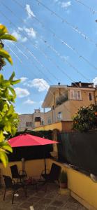 Casalú - Appartamento con Giardino Privato e Parcheggio Gratuito vicino Metro B