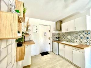 Appartement avec jardin plein sud- Clim wifi et parking
