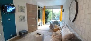 Appartement avec jardin plein sud- Clim wifi et parking