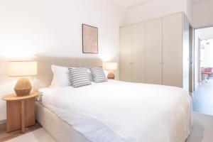 Elegant 2BR w Patio by LovelyStay