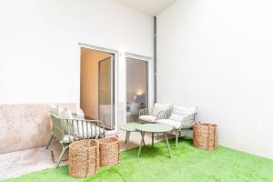 Elegant 2BR w Patio by LovelyStay