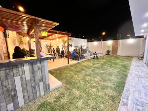 house with pool, grill, bar and garden