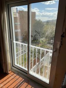 Apartment with balconies and garden