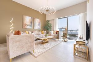 Balcony with Partial Creek Views and Glimpse of the Burj Khalifa, Just Minutes Drive from Dubai Frame, Fawad Azizi Residence, Al Jaddaf by Deluxe Holiday Homes