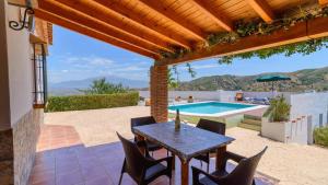 Casa Ramirez Almachar by Ruralidays