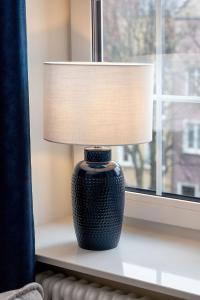 Piękny Apartament na Starym Mieście blisko Fontanny Neptuna by Noclegi Renters