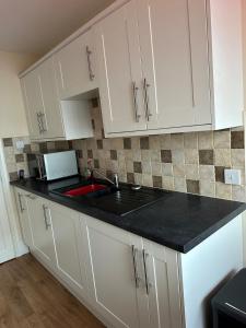 Midships, bright and airy, first floor, centrally located, flat