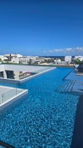 Playas Top Area -- Casa Omega 2BR 2BA tropical retreat, beach, infinite Pool, Gym