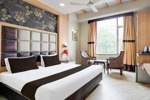 Super Townhouse Bani Park Formerly Aroma Residency