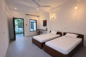 Casa Moon Uppuveli Rooms Apartment & Hostel