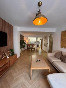 Elegant central apartment with patio