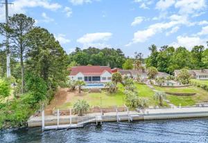 Paradise on Ocean Waterway Huge 5000 sq ft w Private Pool, Boat Dock, Grand Piano, Game Tables, BBQ, 1 acre Yard, Crib, Sleeps 34