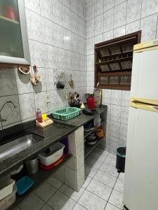 Casa a 200m da praia com 7 camas e Churrasqueira