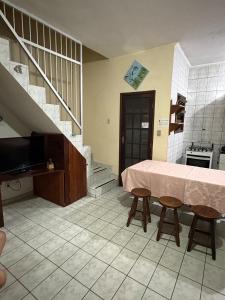 Casa a 200m da praia com 7 camas e Churrasqueira