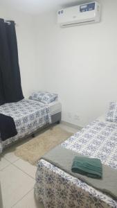 Apartamento 2 quartos com Suite -Garagem -Praia -Shopping e Faculdade
