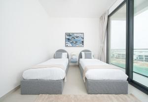 Stunning 2BR Sea View in Blue Bay Walk