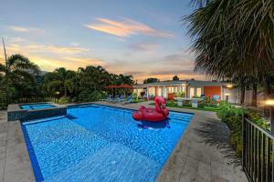 Fancy Flamingo - Canal Front, Dock, Heated Pool & Spa by Anna Maria Life Vacation Rentals