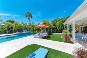Fancy Flamingo - Canal Front, Dock, Heated Pool & Spa by Anna Maria Life Vacation Rentals
