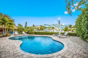 Soulshine - Dog Friendly! Pool, On a Canal with Dock by Anna Maria Life Vacation Rentals