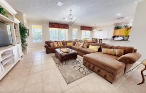 Sprawling home with pool, pool spa, & game room - athletic court and gym access
