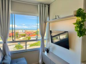 Apartamento com vista mar e perto da praia