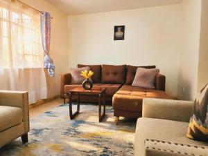 Modern Apartment Near JKIA & SGR Fast WIFI and Self Check-in