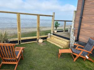 Traumlage Nr 59 5 Meter direkt am Wattenmeer erste Reihe Luxus Chalet unendliche Weite, eingebettet in der Natur