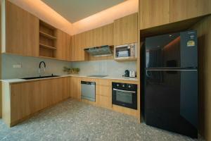 Modern 4BR Villa with Private Pool close to Boat Avenue in Bangtao