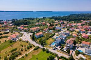 Villa Bellatrix in Fažana with beach front and sea view