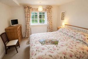 Brookside, Hawkshead with garden and parking in popular village