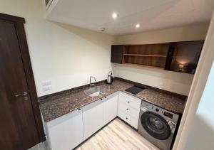 Nuzul Stay Luxury City Studio Near Airport