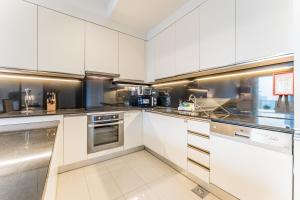 Sky-High 1BR with Stunning Direct Marina Views, Steps from the Metro and Offering Seamless Access to Marina Mall, The Address Residences, Dubai Marina by Deluxe Holiday Homes
