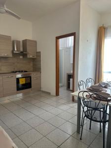 Veranda Privata e BBQ -Comfort Moderno per 4 La Caletta