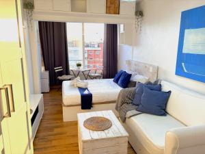 Evans Realty CO Estudio en la playa y piscina